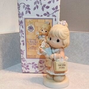 Precious Moments Spa Store Figurine in Cream and Tan.